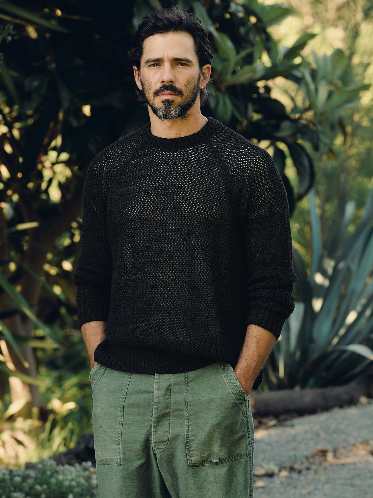 cascabel open weave sweater in black