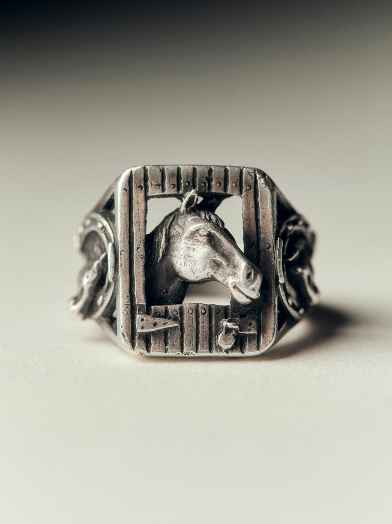 vintage silver horse in stable ring