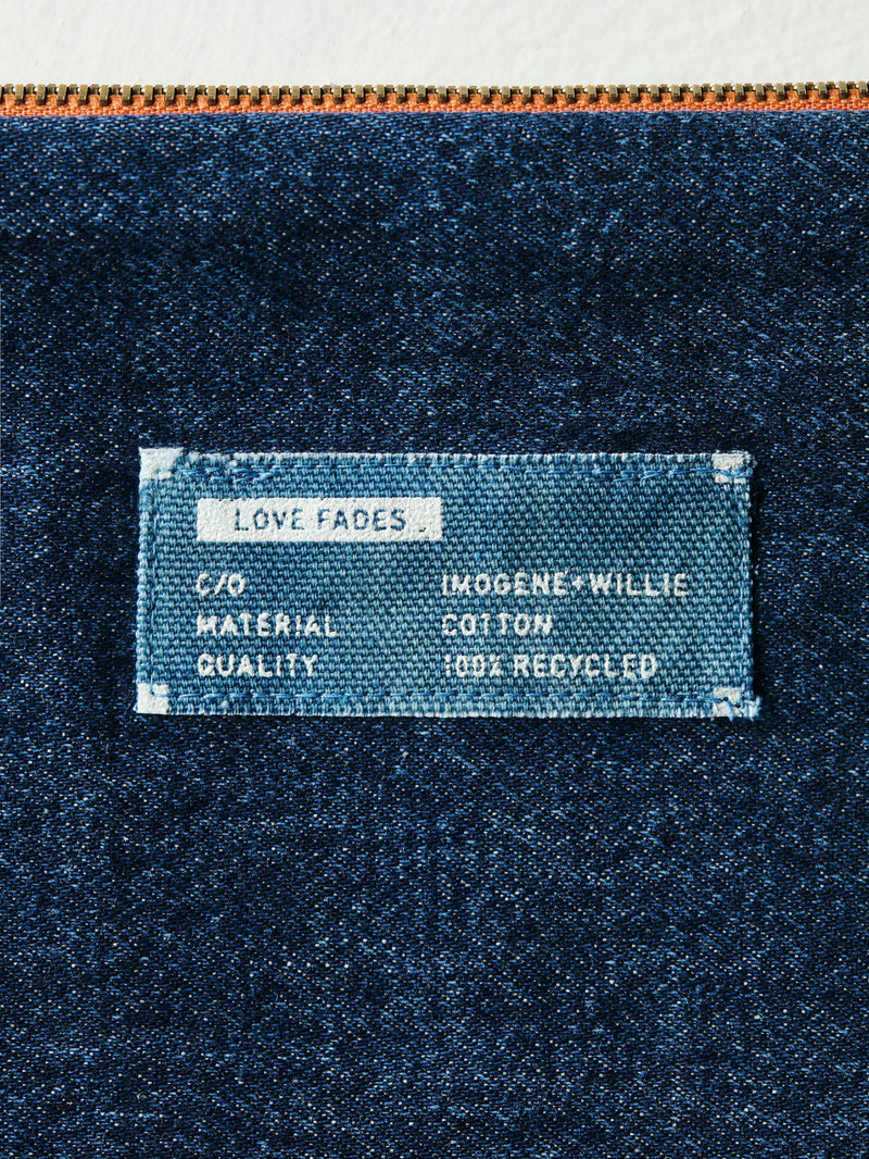 love fades recycled denim zipper pouch - Model