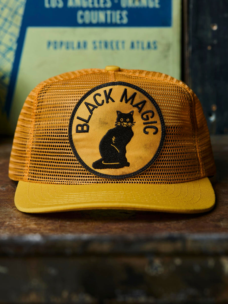the "black magic" mesh trucker