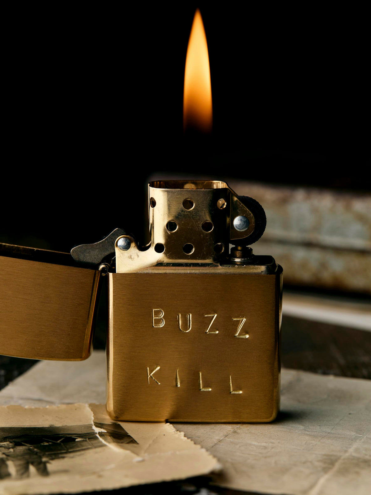 hand stamped “buzz kill” zippo