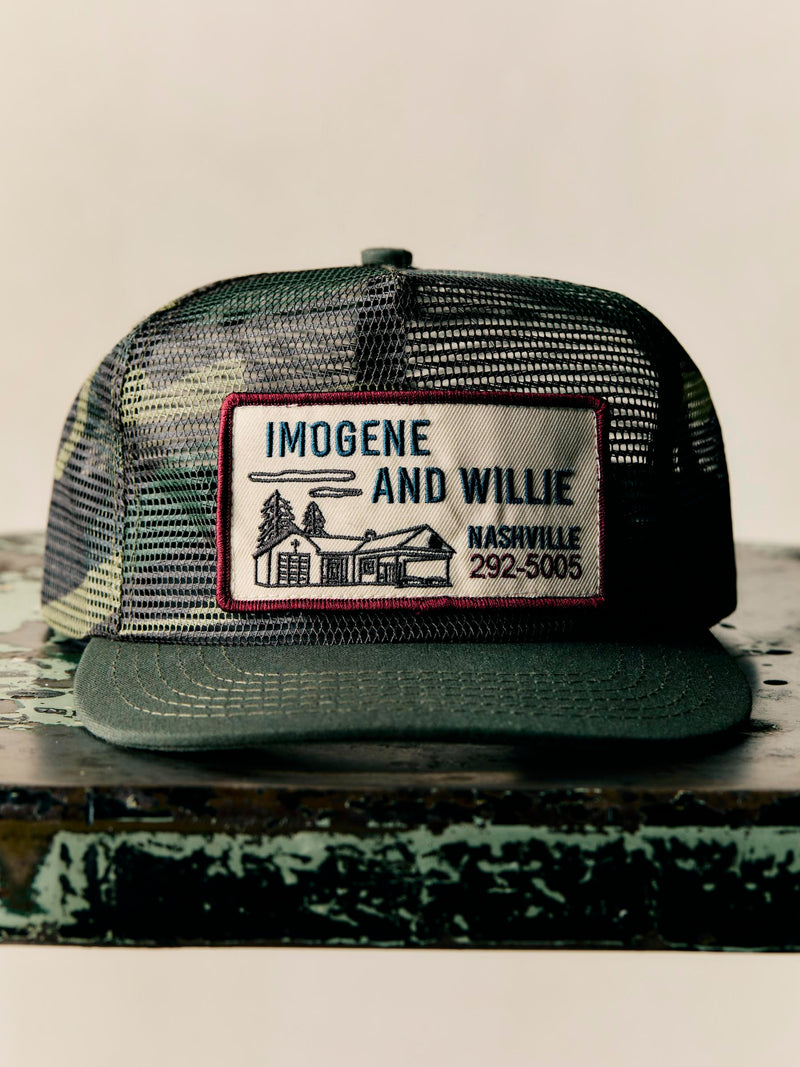 the "service station" mesh trucker in camo