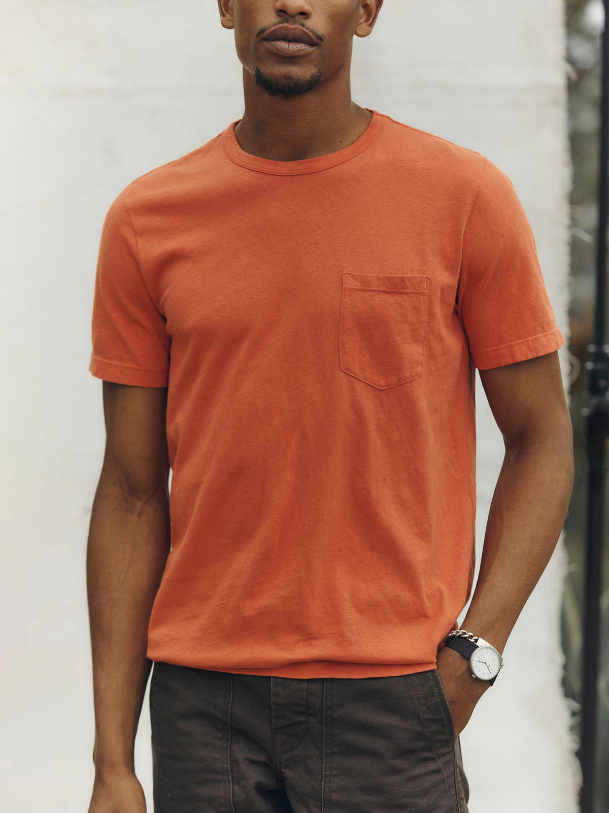 faded orange knit pocket tee