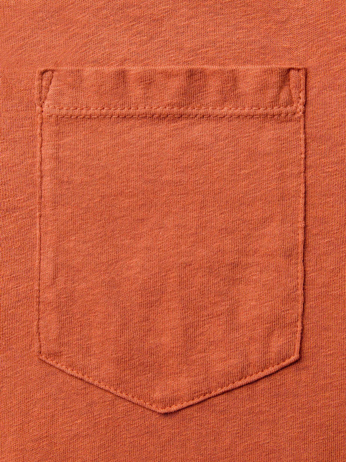 faded orange knit pocket tee