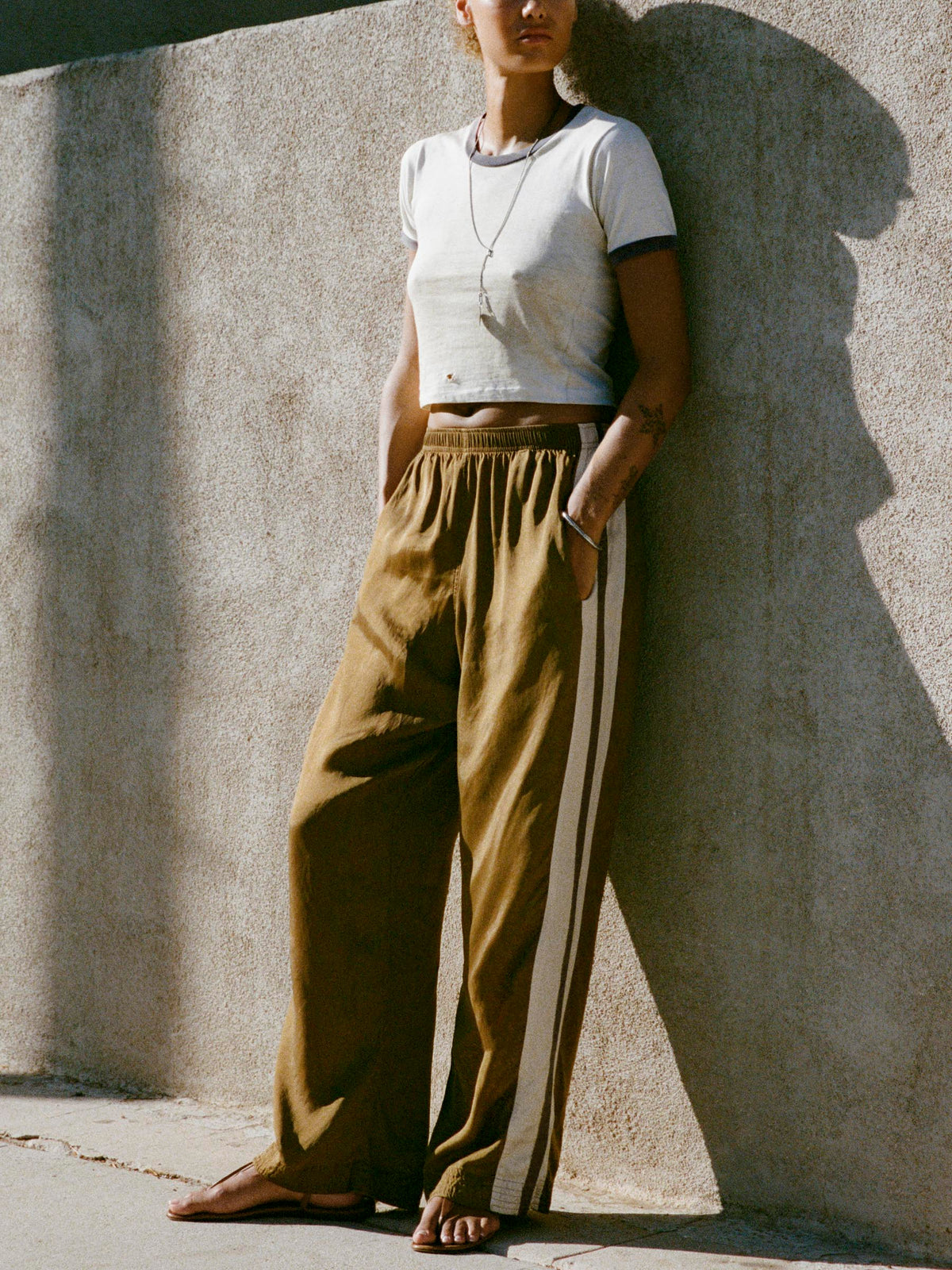 striped track pant in gold